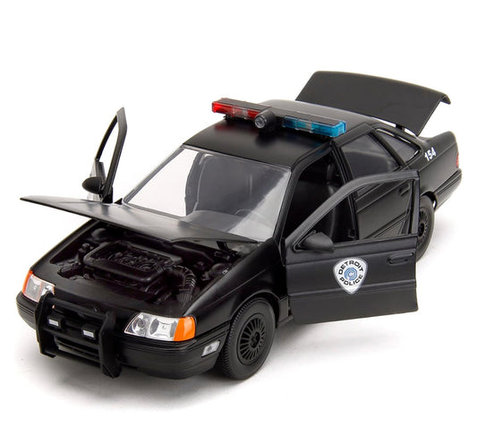 Robocop & OCP Ford Taurus 1987 Pack Vehículo y Figura Diecast Jada Toys 1/24